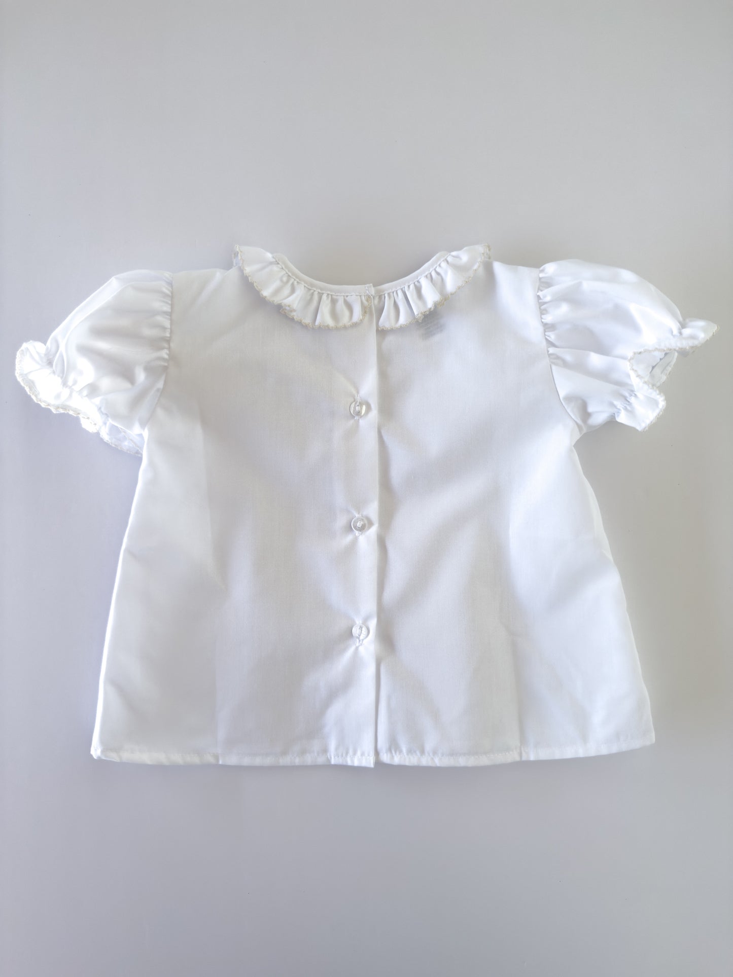 White/Ecru Trim Ruffle Button Blouse