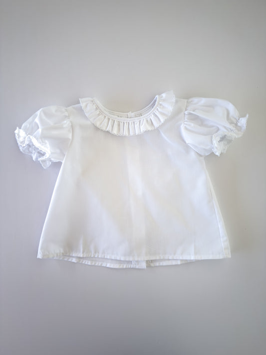 White Ruffle Button Blouse