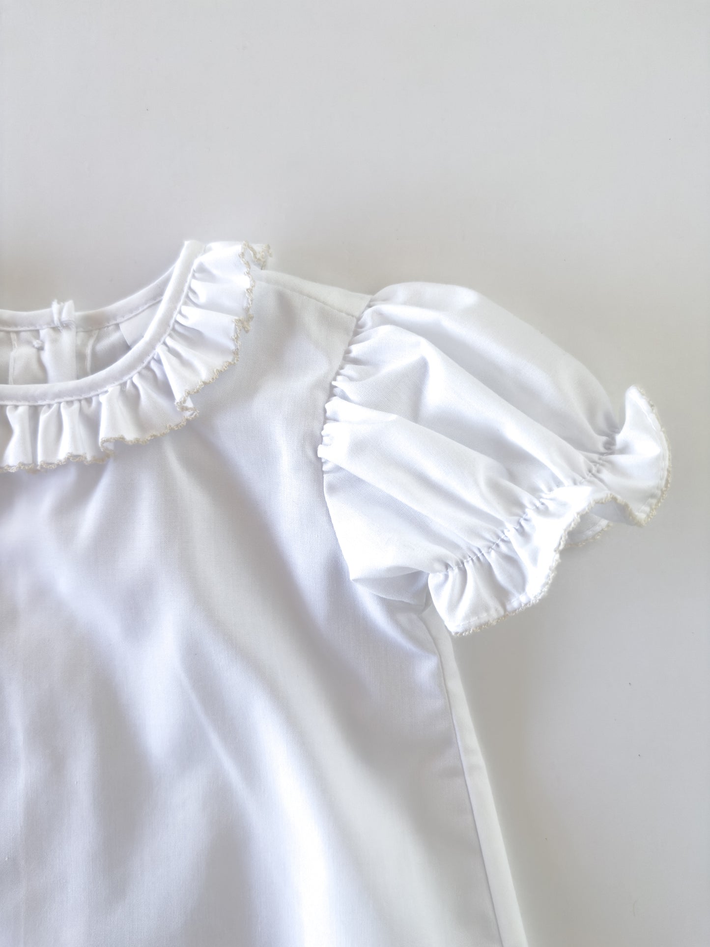 White/Ecru Trim Ruffle Button Blouse